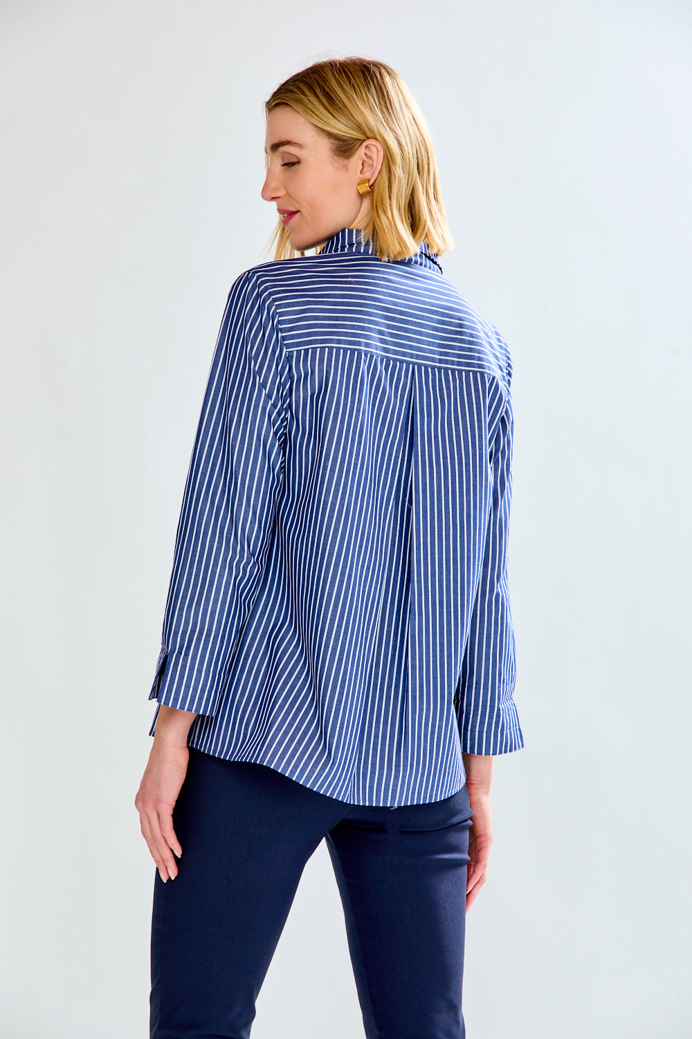 Woman in blue striped blouse