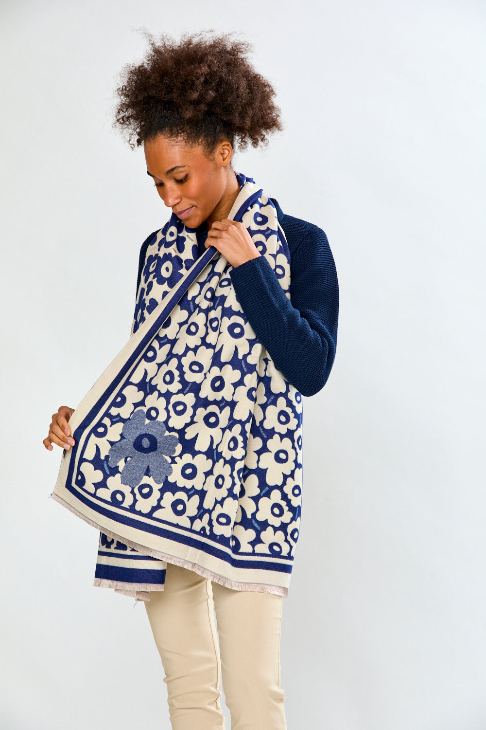 Woman in navy floral scarf