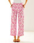 Woman in pink and white printed pant