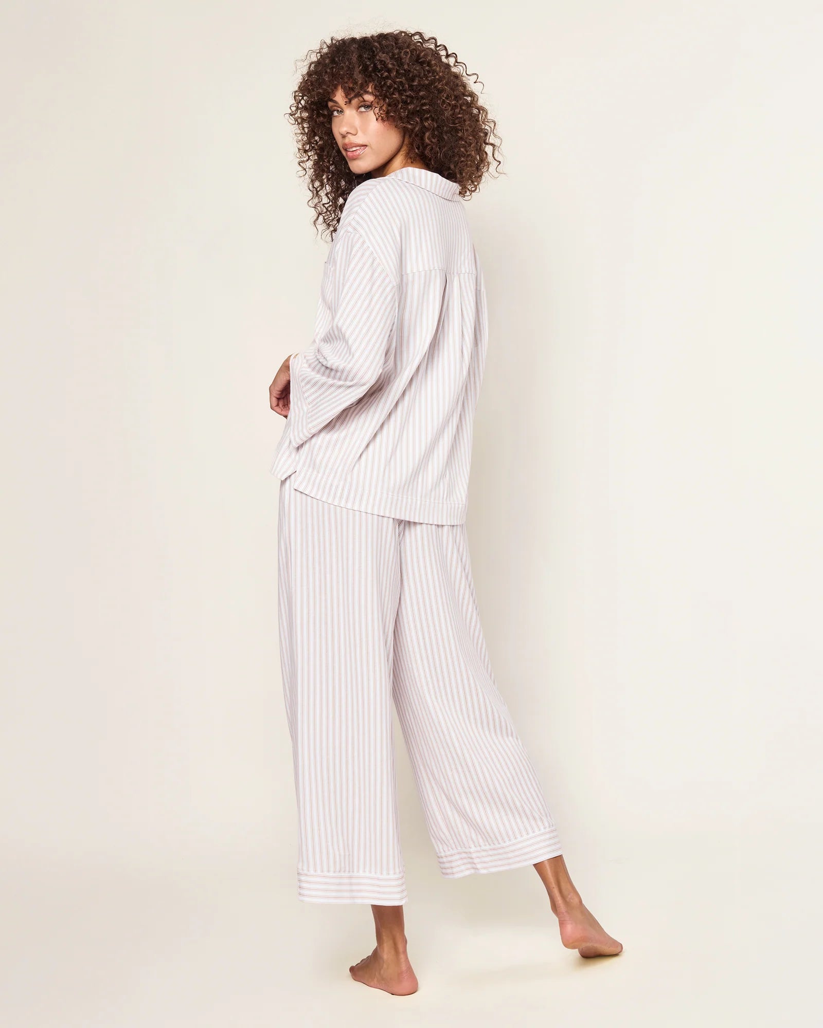 Woman in beige pajamas