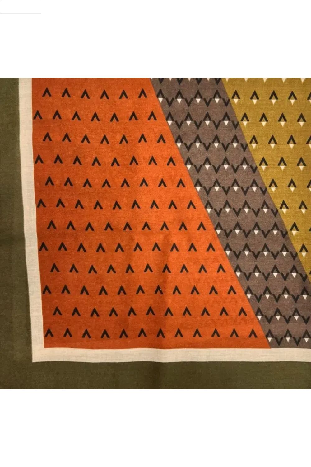 Multicolored patterned scarf on a white background