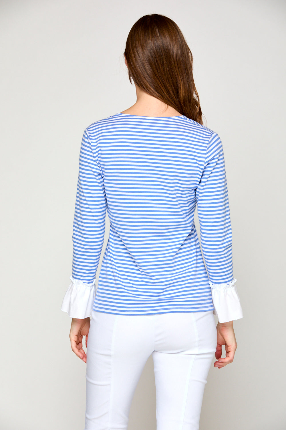 Woman in blue and white stripe top