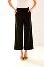 Woman in black wide leg pant