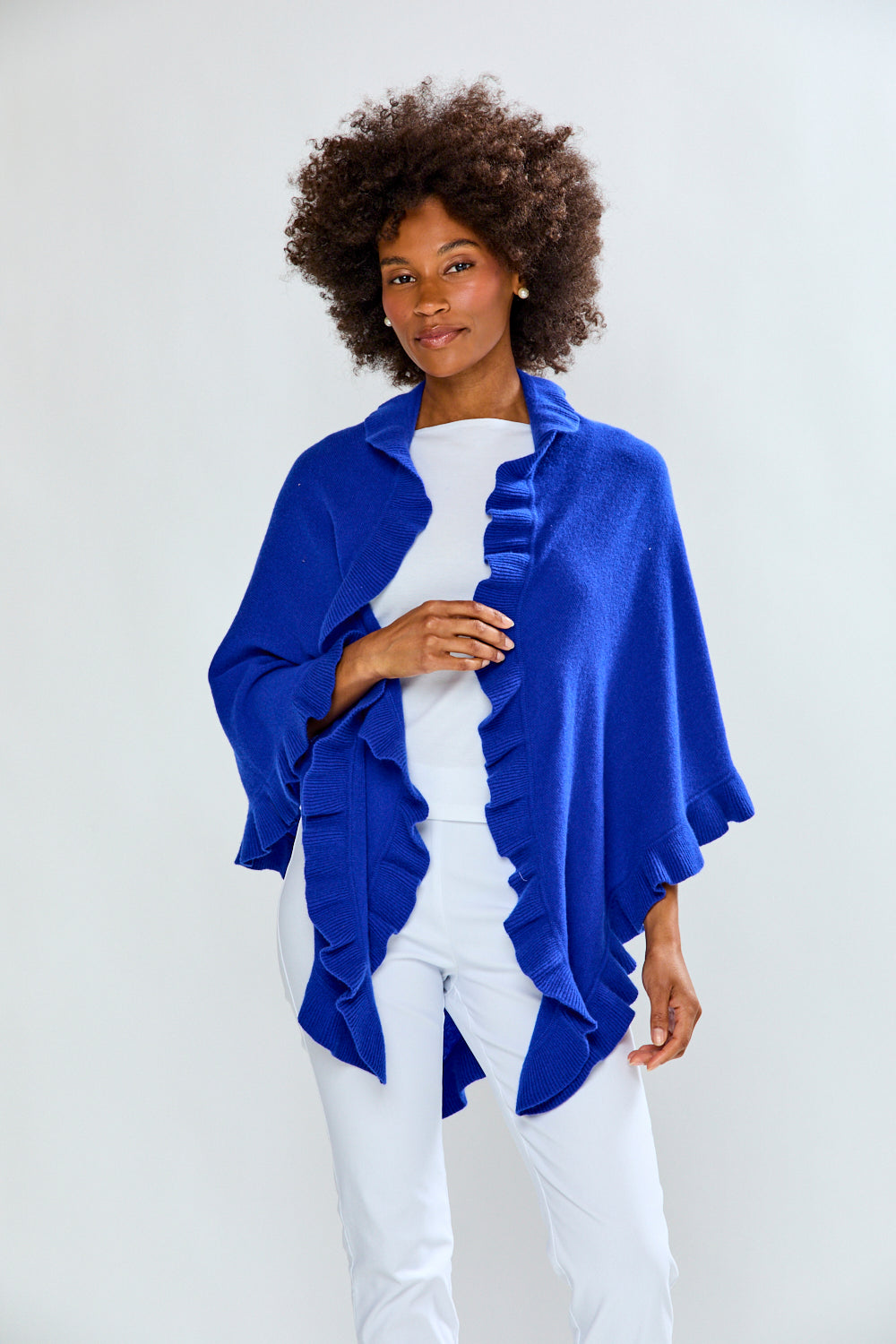 Woman in blue cashmere triangle wrap