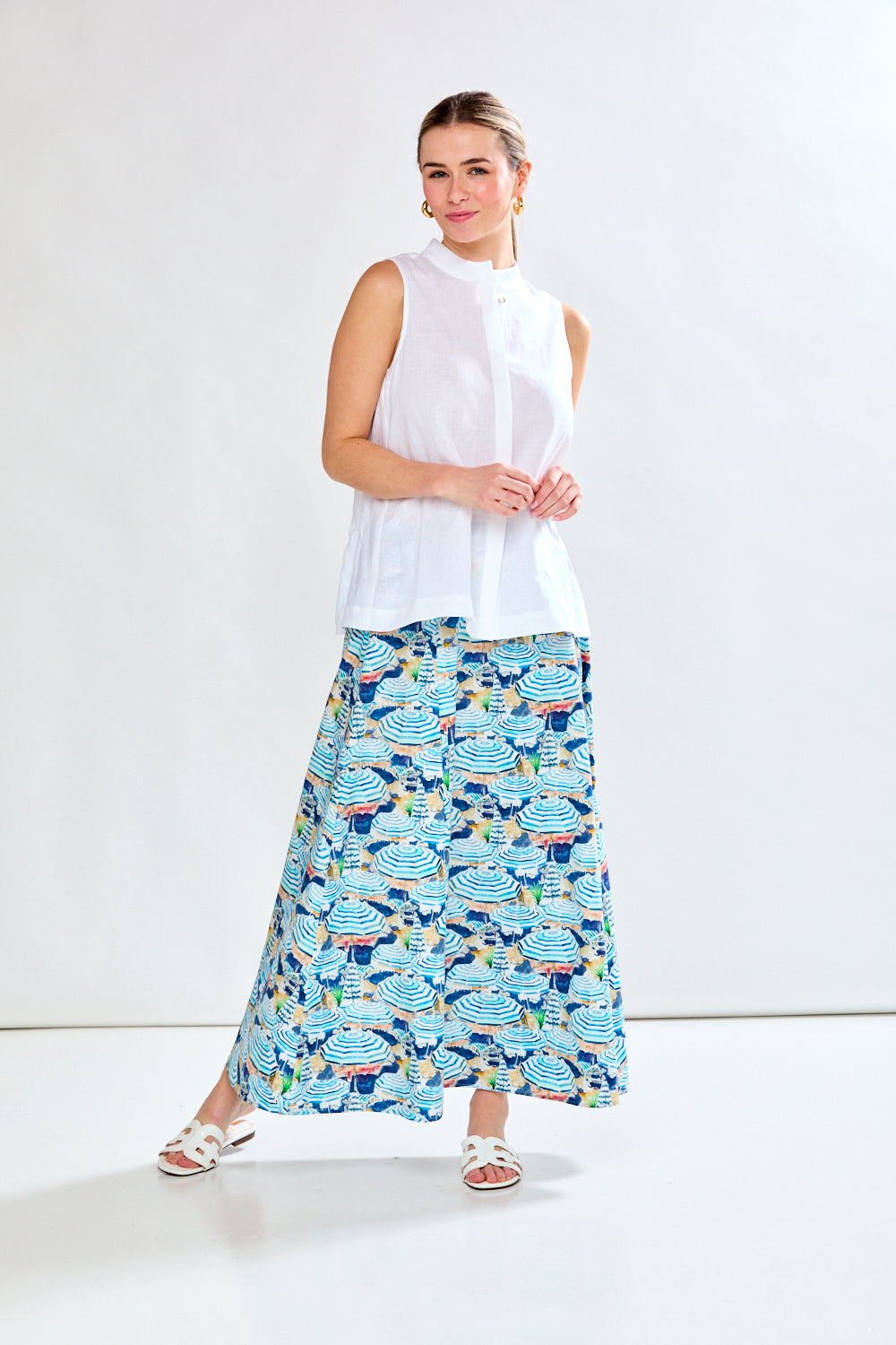 Woman in blue printed skirt