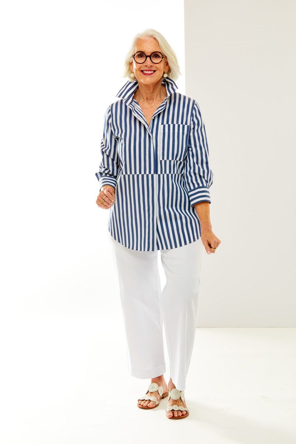 woman wearing navy & white striped button down with front pocket