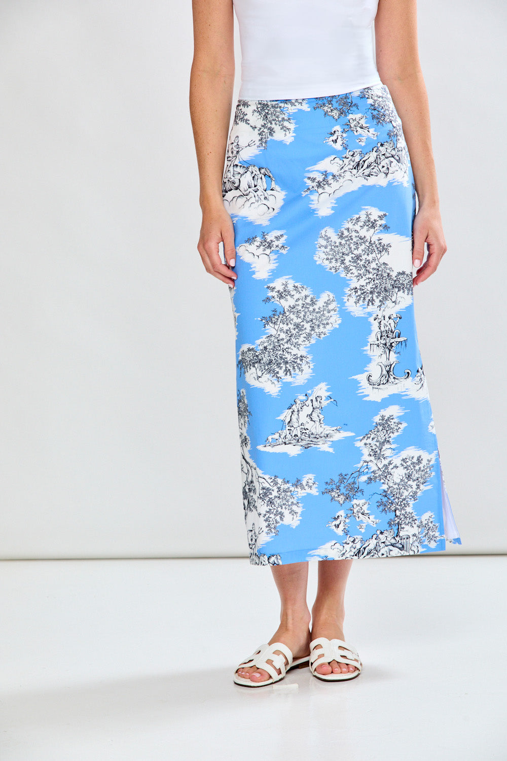 Woman in periwinkle toile midi skirt
