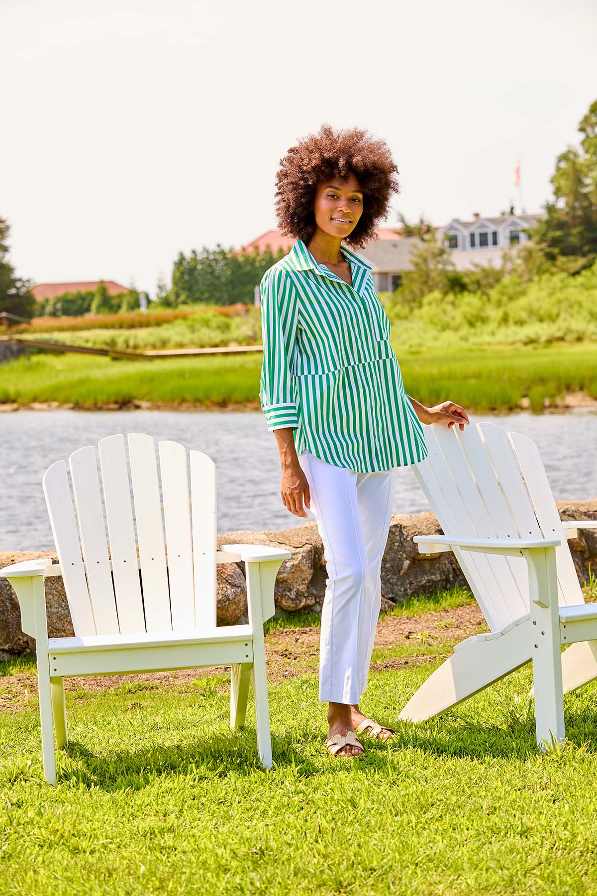 Woman in green and white stripe blouse