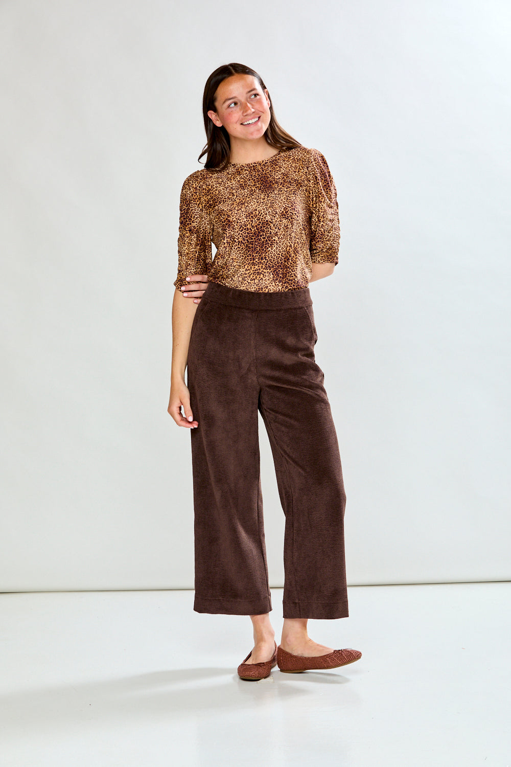 Woman in espresso corduroy pant