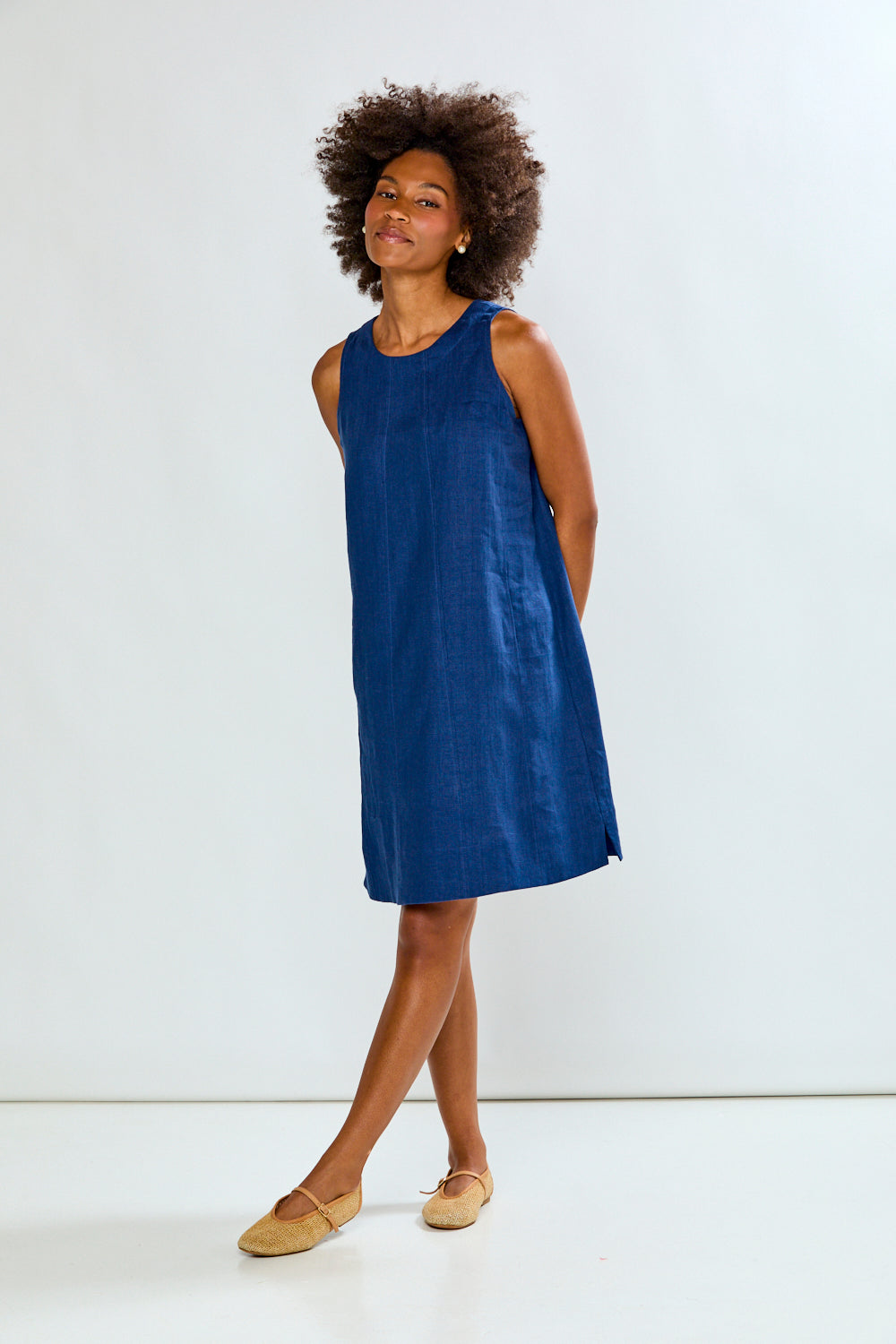 Woman in navy linen dress