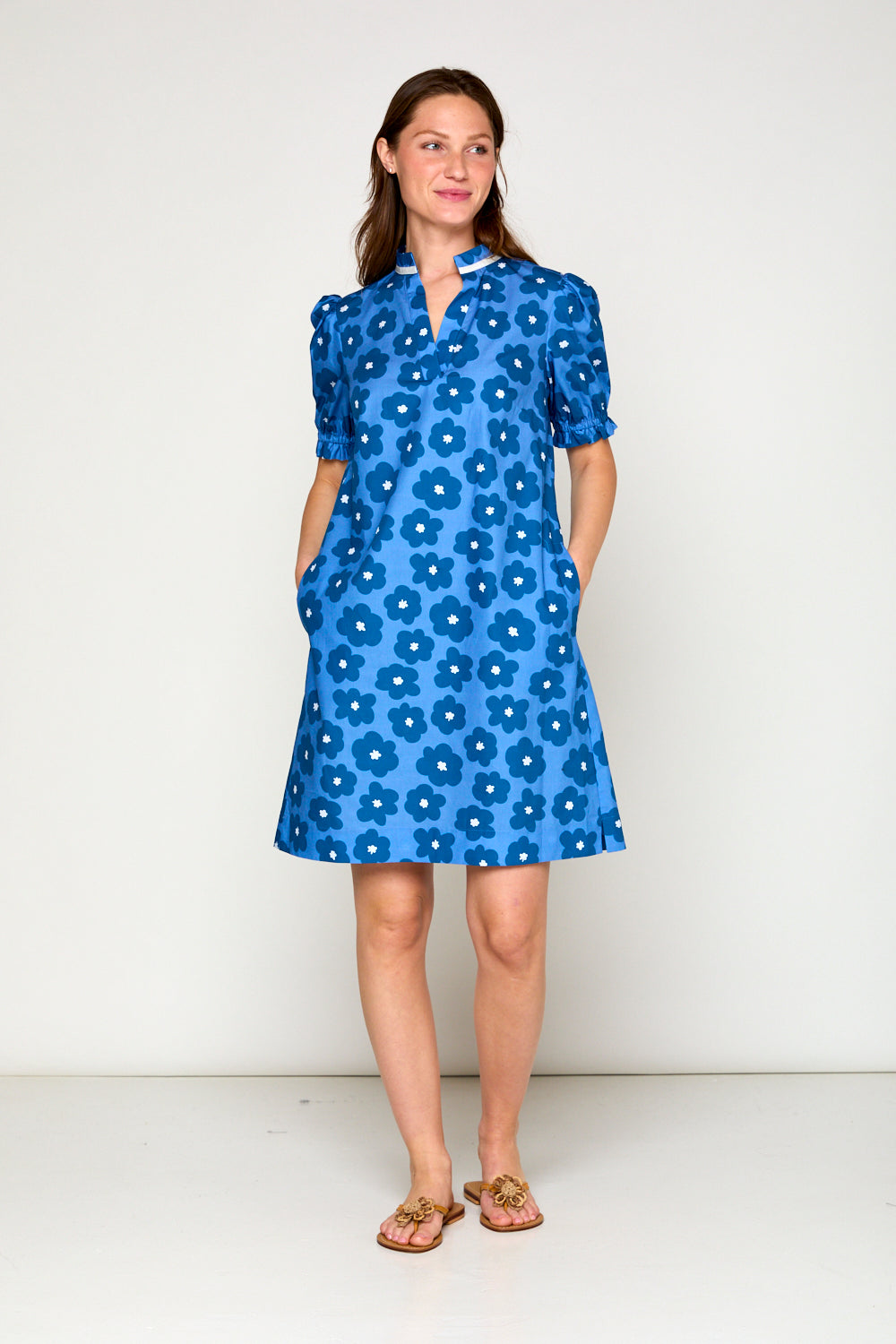 Woman in blue daisy dress