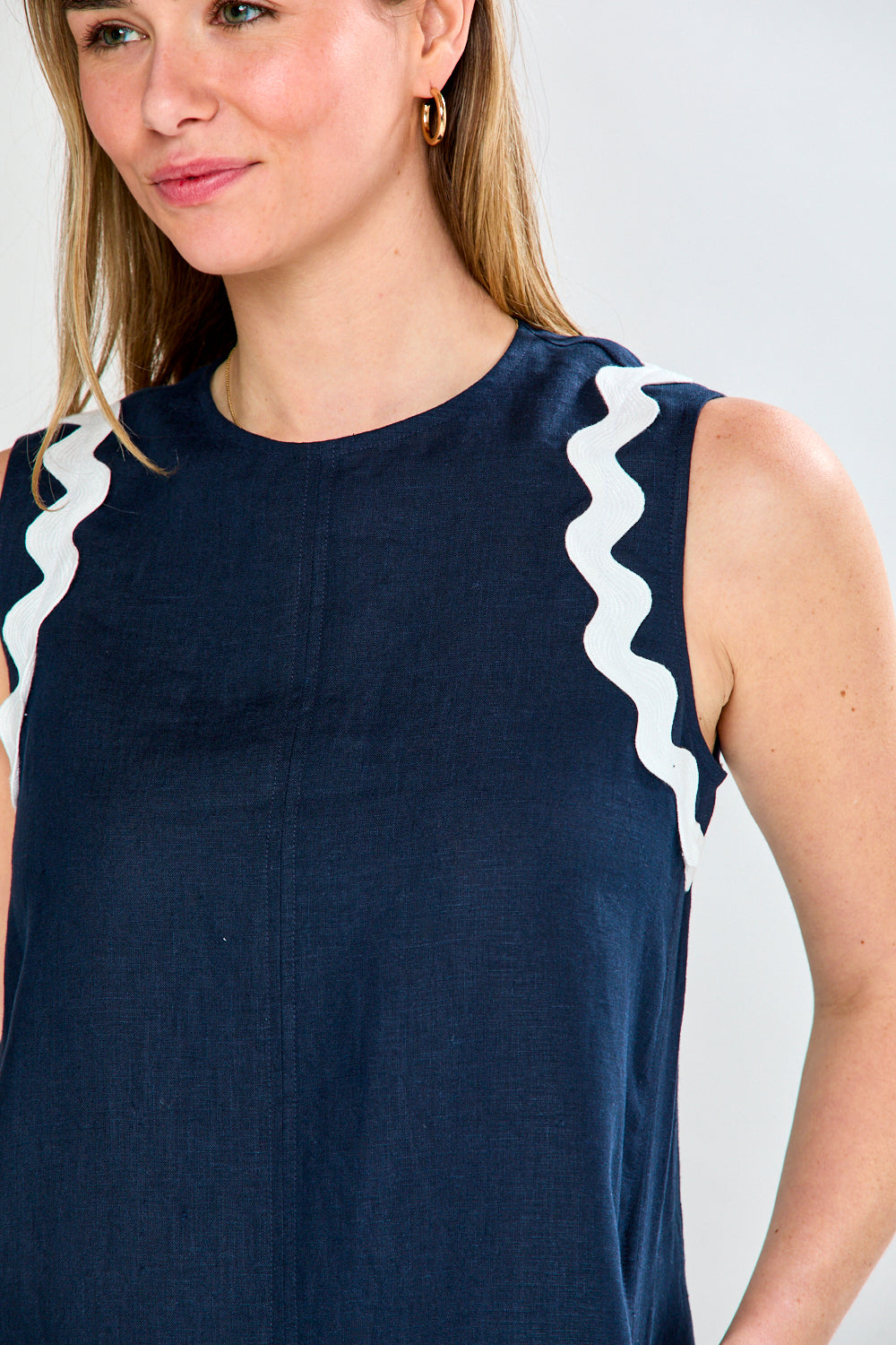 Woman in ric rac detail dress
