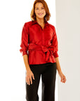 Woman in red button down