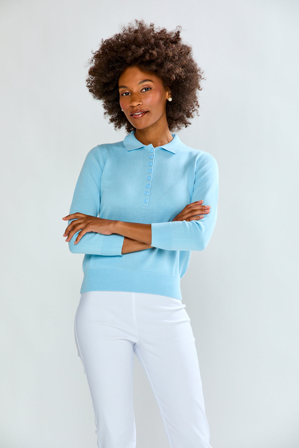 Woman wearing 3/4 Sleeve Henley Pullover in Powder Blue