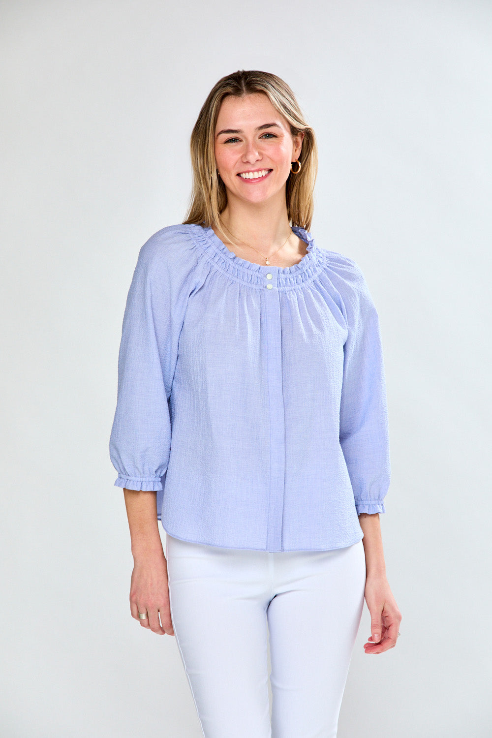 Woman in seersucker blouse