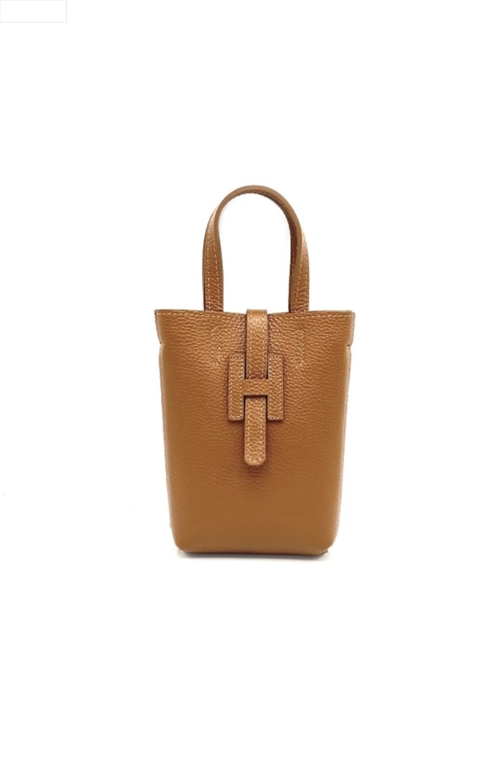 Camel leather handbag on a white background