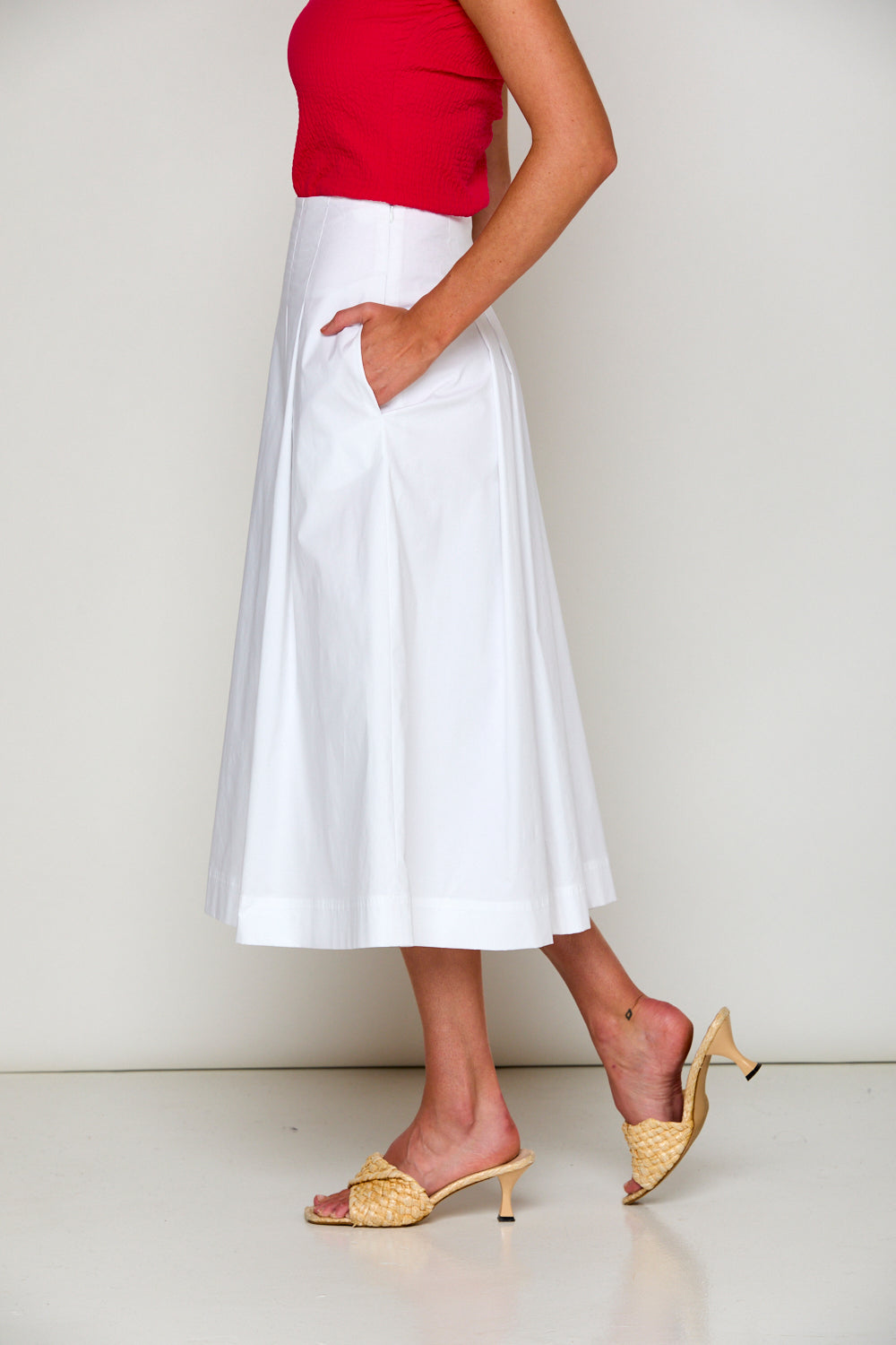 Woman in white skirt