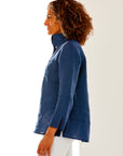 Woman in navy linen blouse