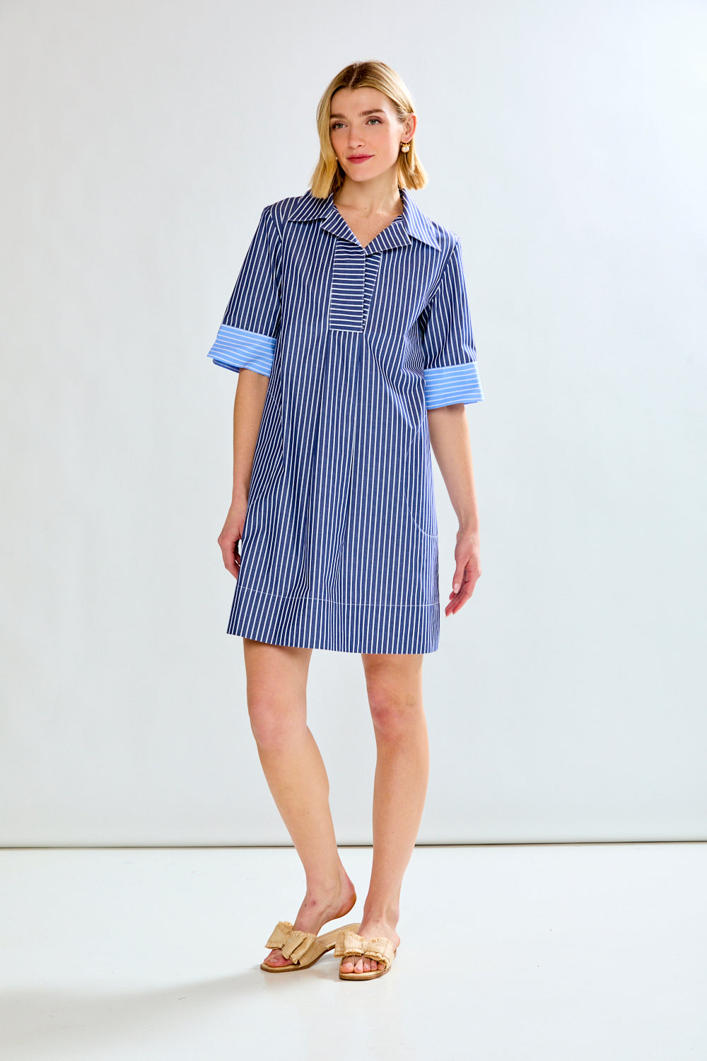 Woman in blue striped dress