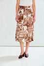 Woman in toile print skirt