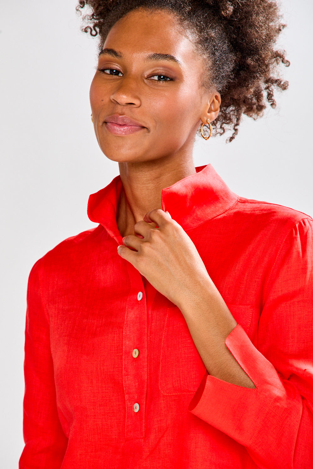 Tomato colored shirt on a women