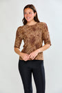 Woman in leopard print top