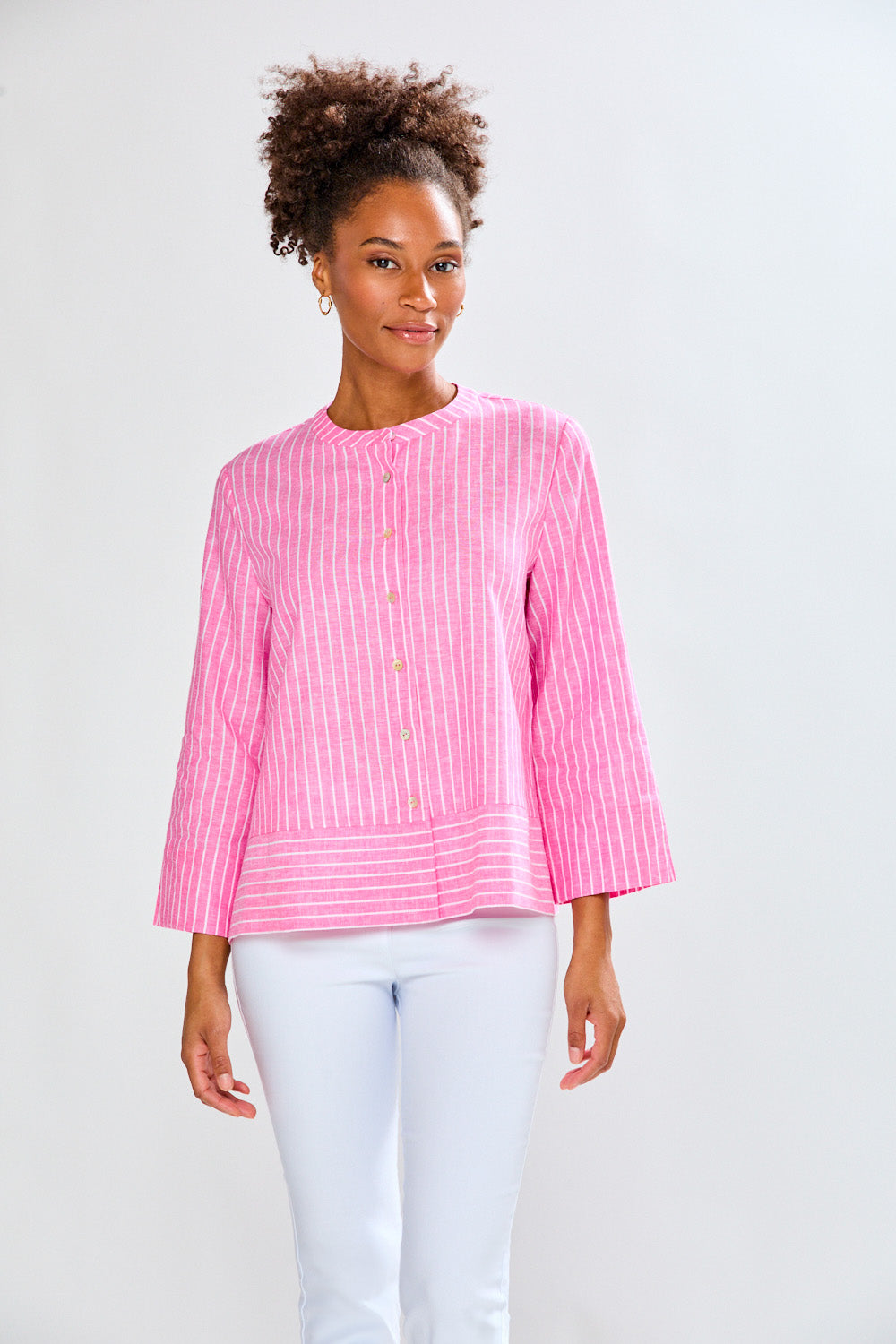 Woman in pink striped tunic