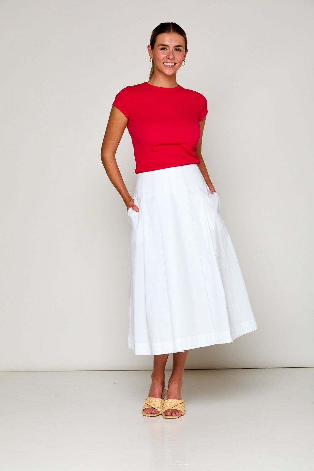 Woman in white skirt