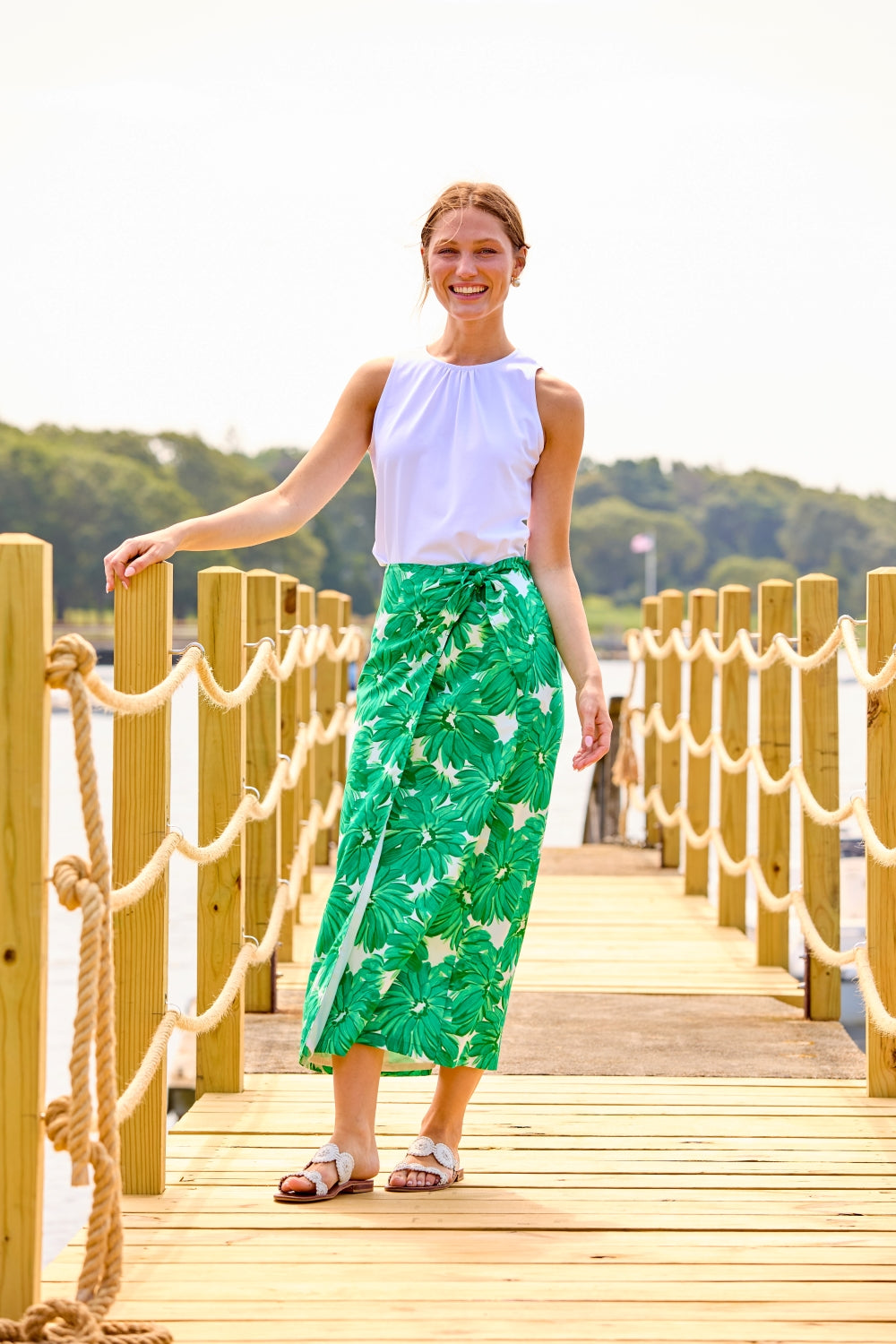 Woman in white sleeveless top