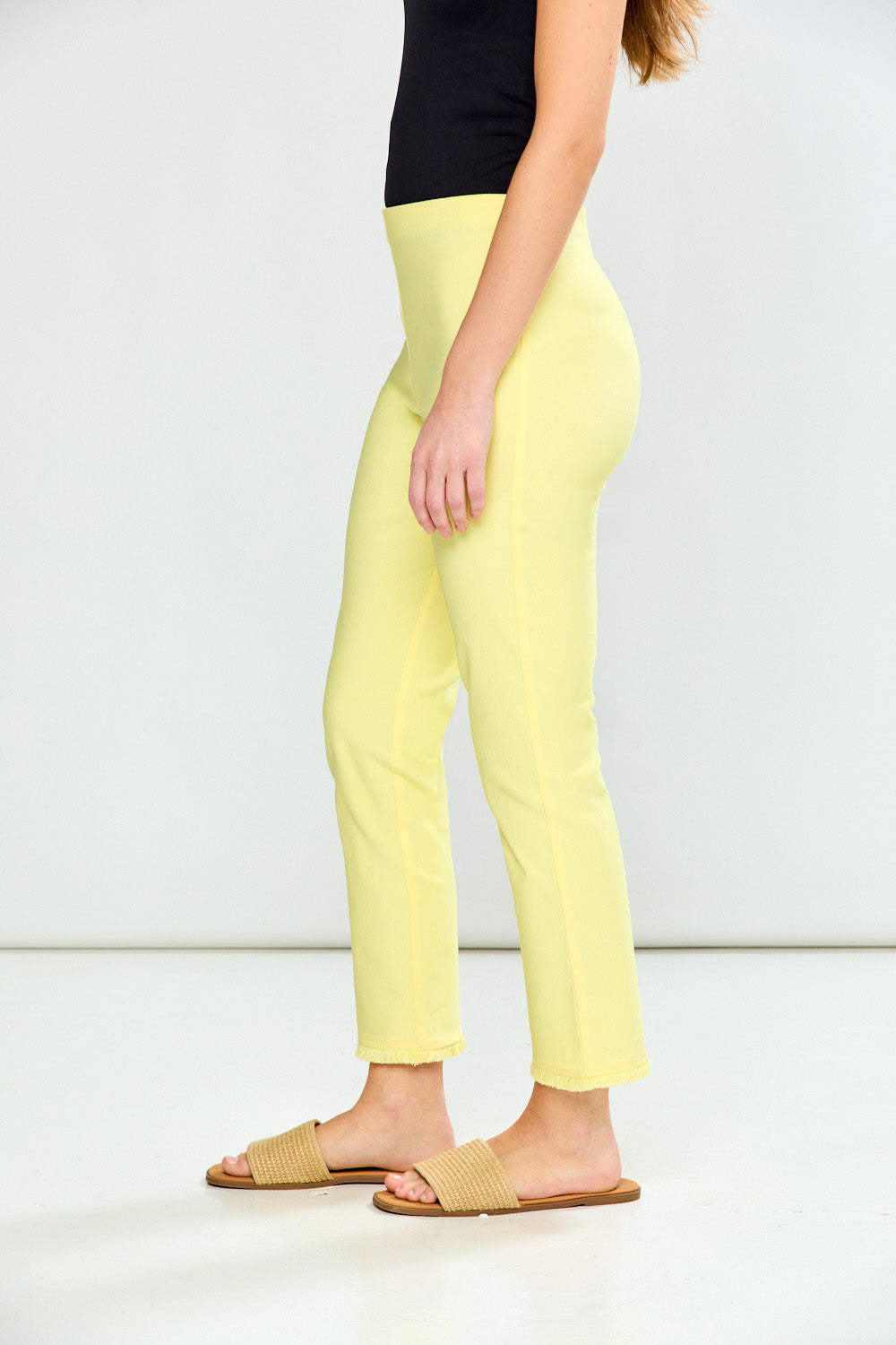 Person wearing Guava pants on a white background