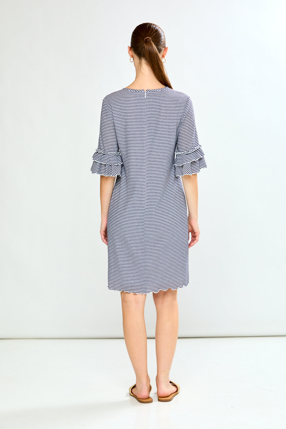 Woman in striped dress