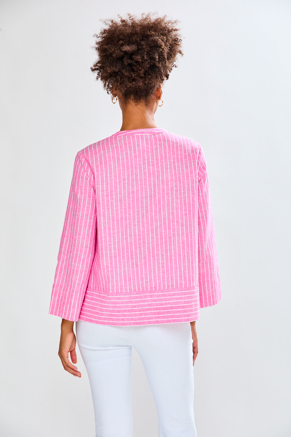 Woman in pink striped tunic
