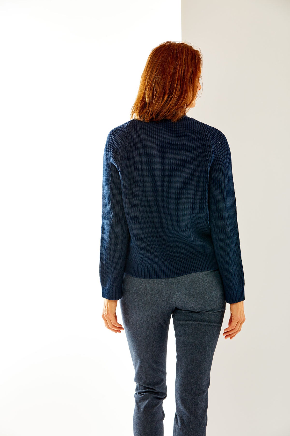 Woman in navy sweater