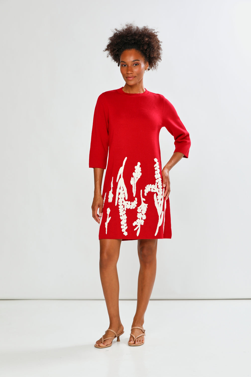 Woman in red printed dress