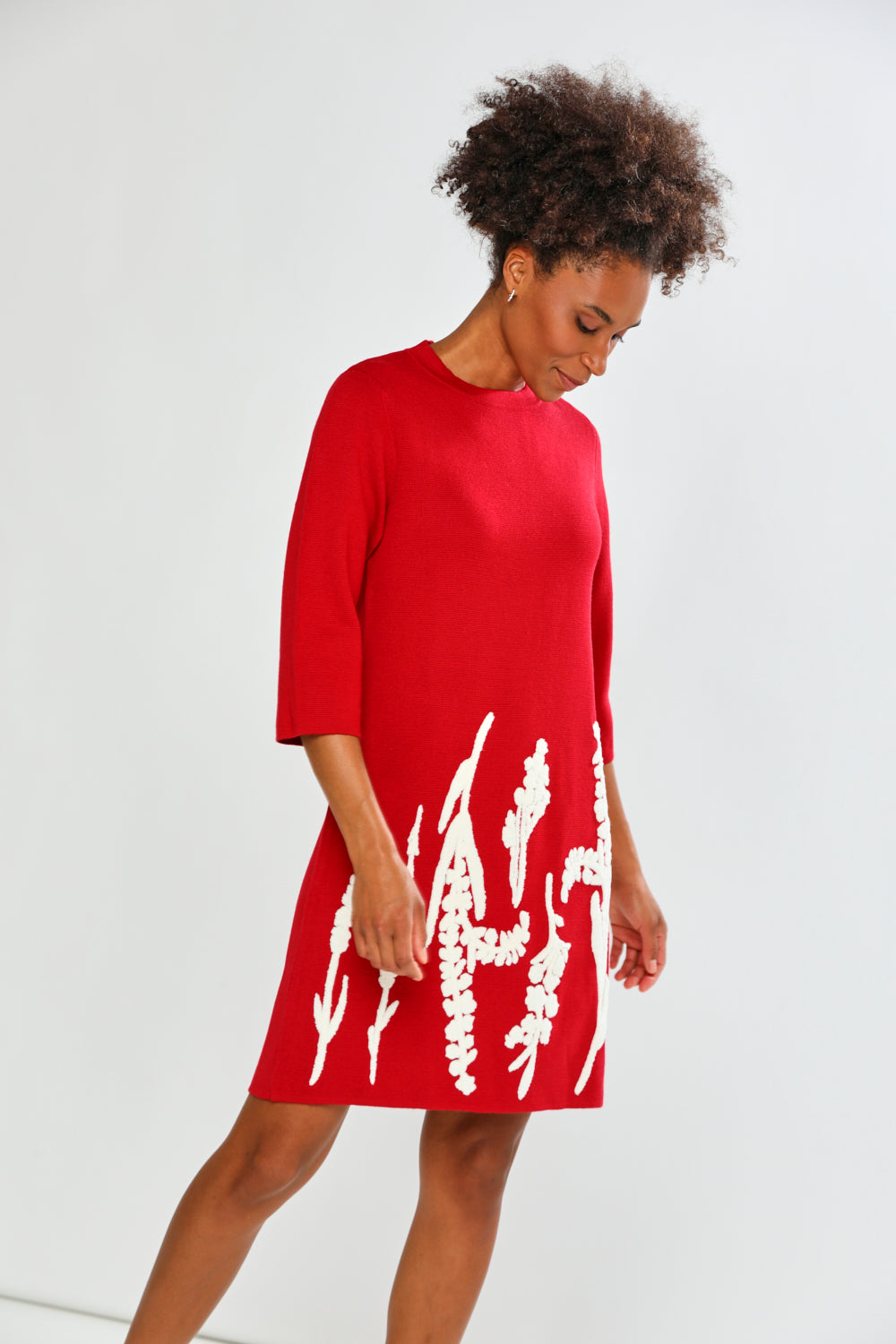 Woman in red printed dress