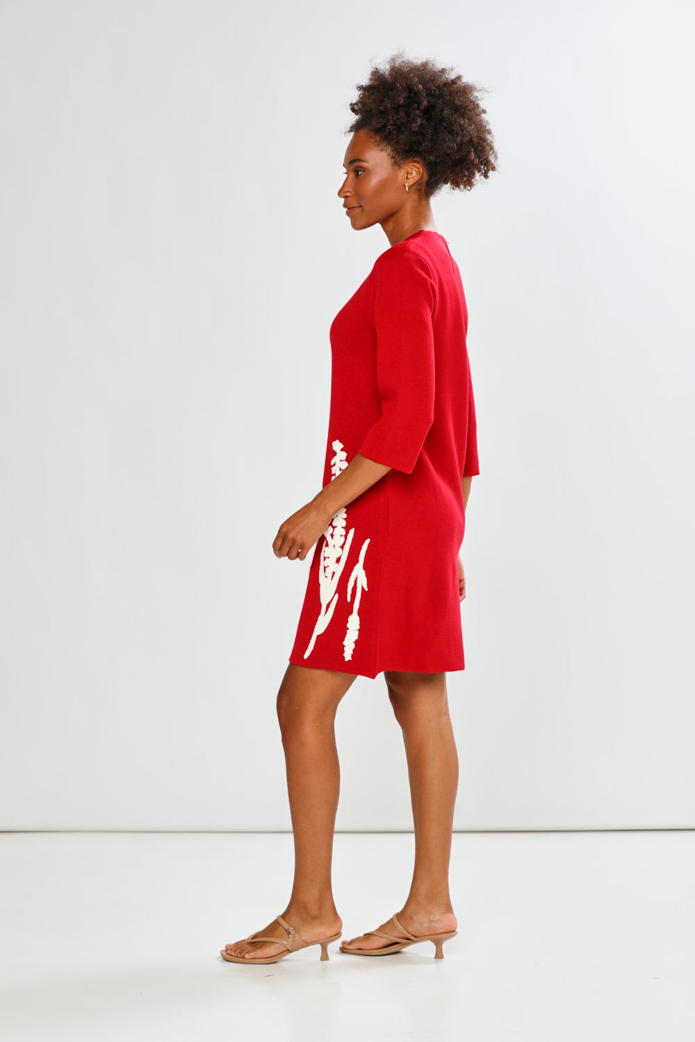 Woman in red printed dress