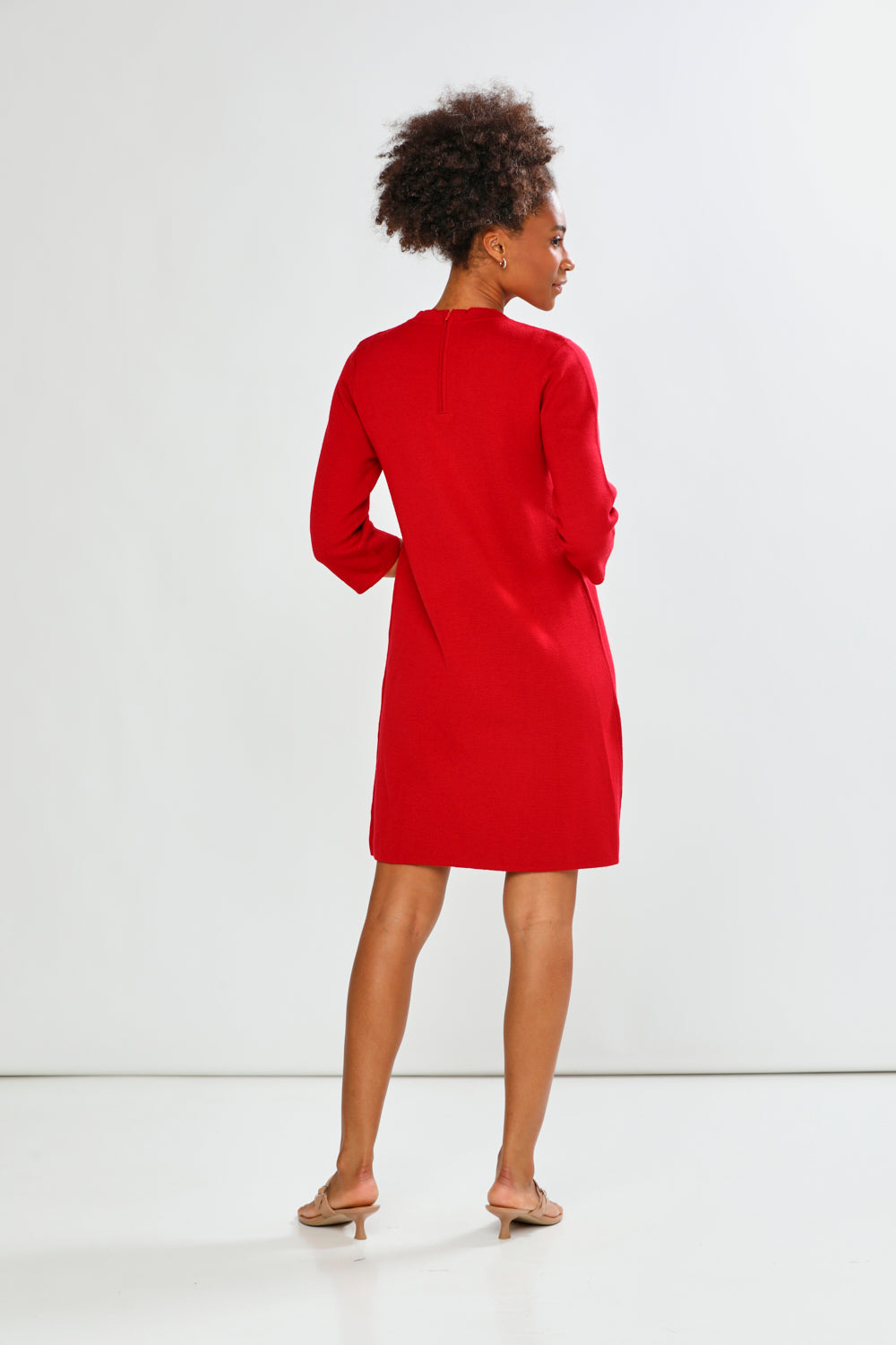 Woman in red printed dress