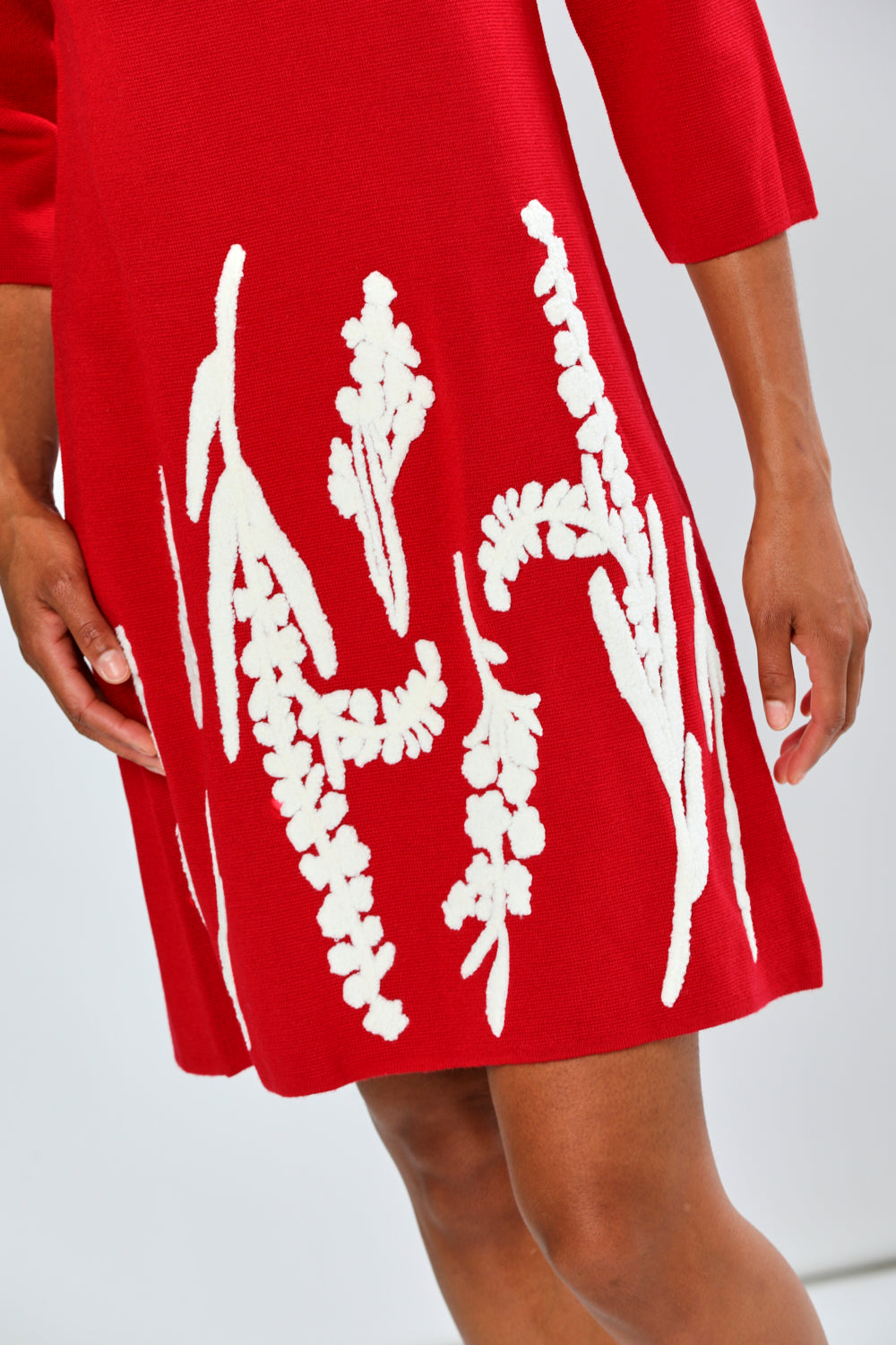 Woman in red printed dress