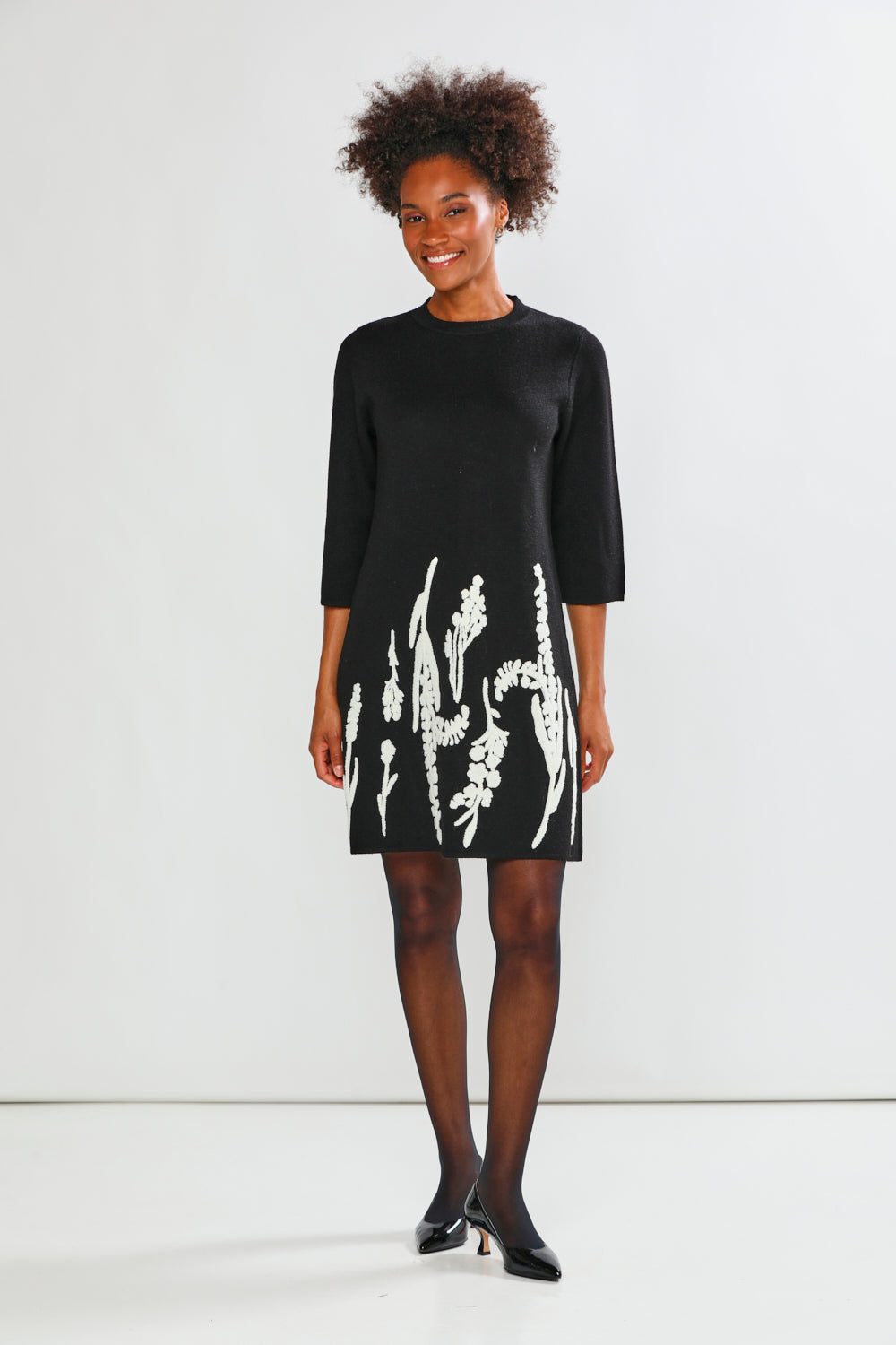 flower sweater dress Sweetest Smile Floral in Black over floral intarsia design Above Tropical Garden Sweater Dress |