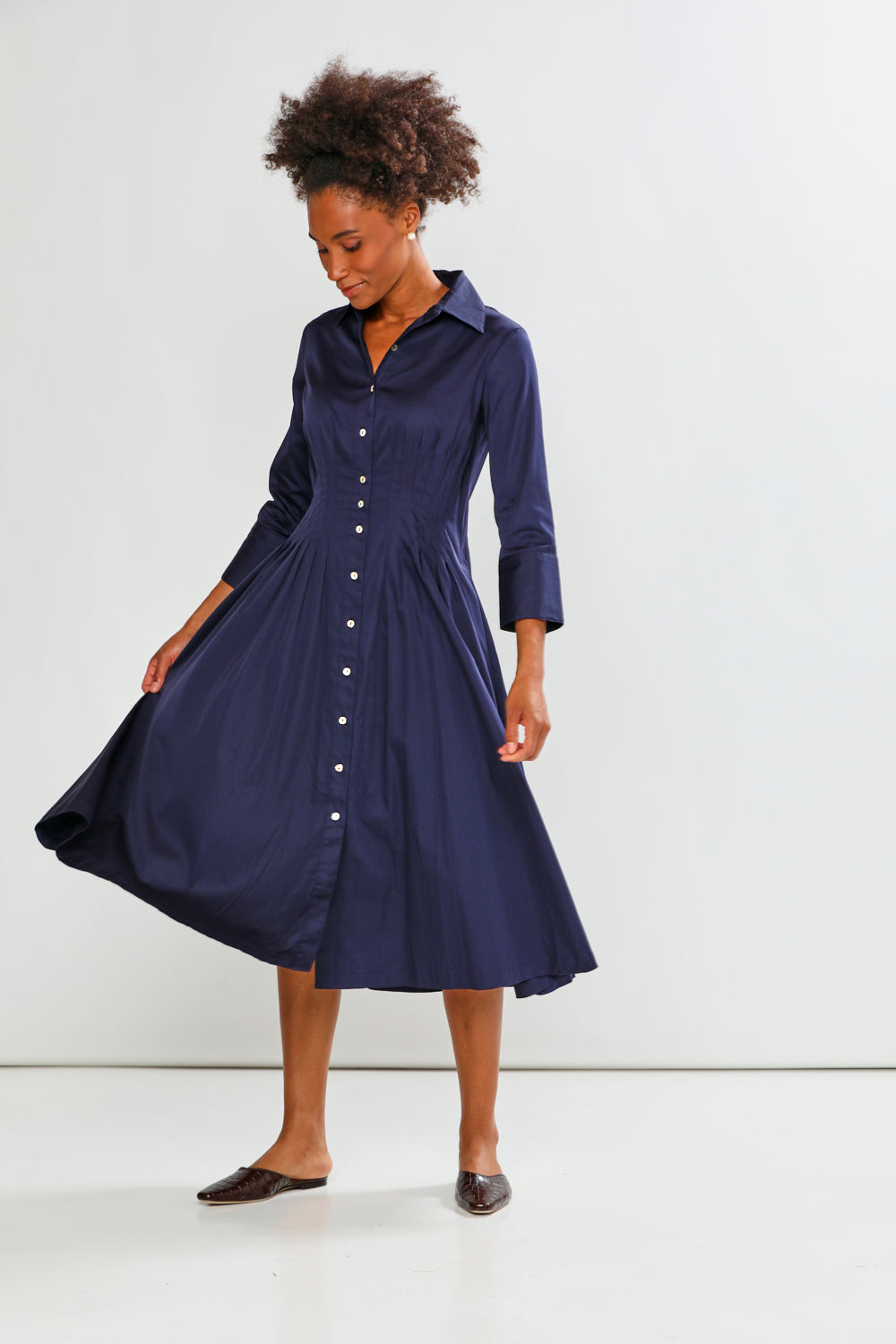woman in navy dress