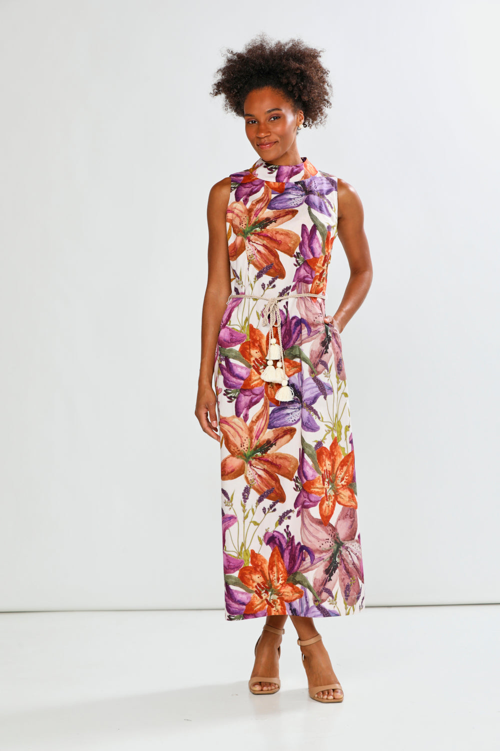 Woman in floral sleeveless dress