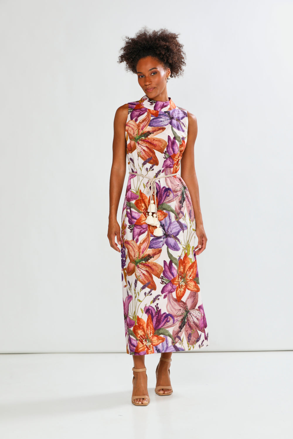 Woman in floral sleeveless dress
