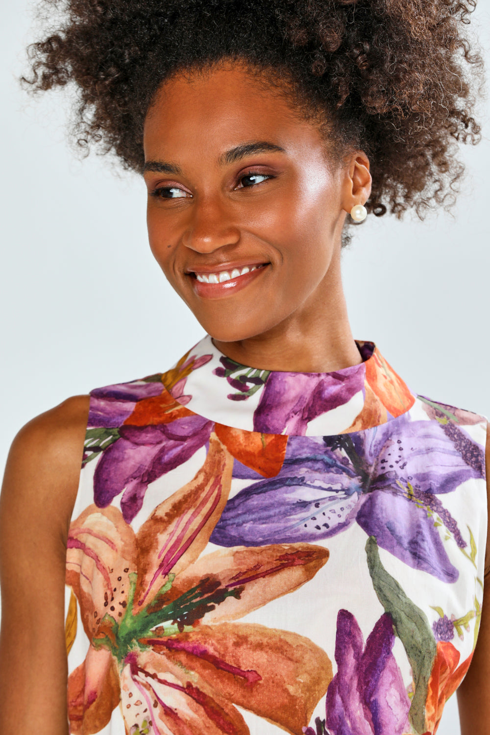 Woman in floral sleeveless dress