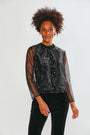 Woman wearing an organza jacket