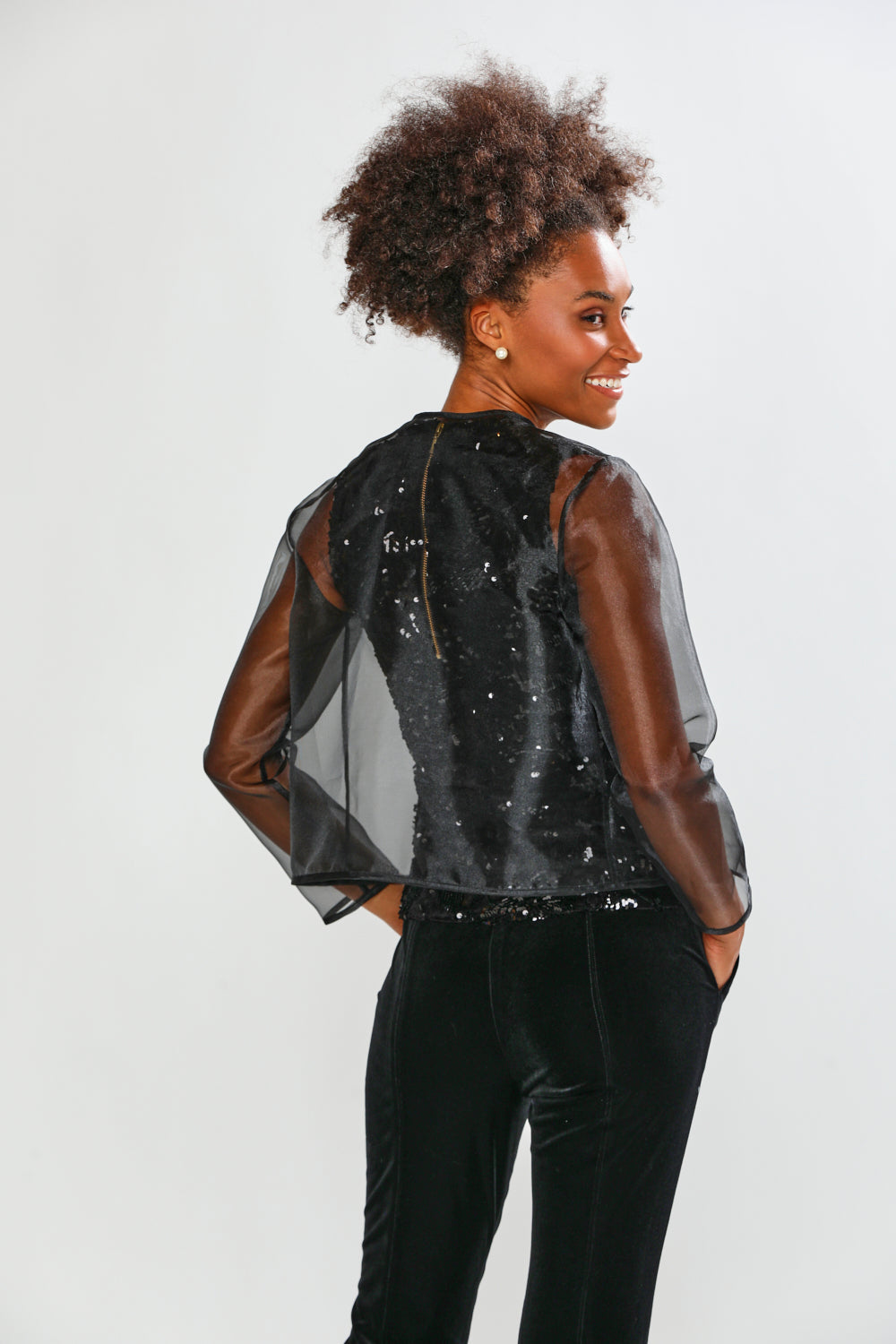 Woman wearing an organza jacket