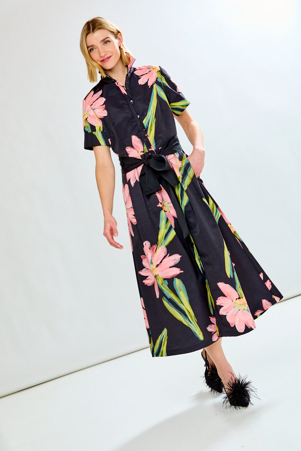 Woman wearing MARISOL DRESS IN FLORAL COSMOS - FLORAL COSMOS