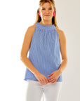 Woman in blue/white gingham top