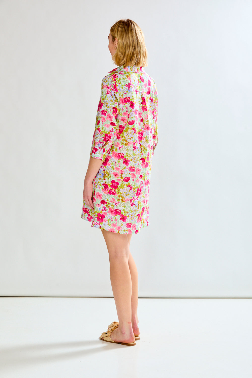 Woman in floral linen dress