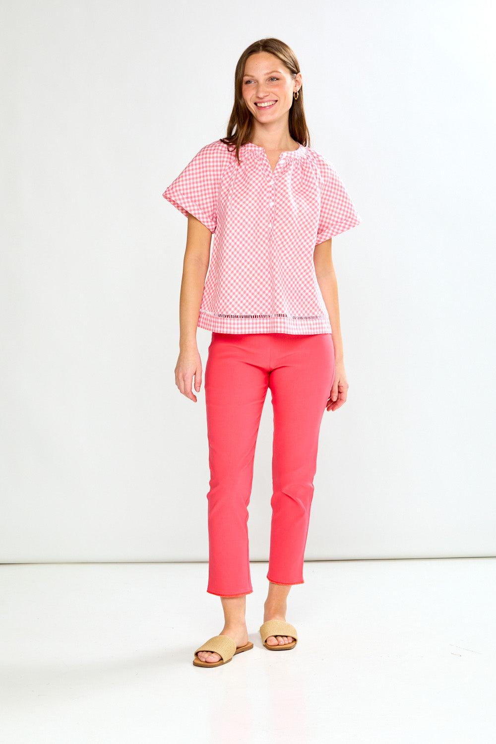woman in pink gingham top