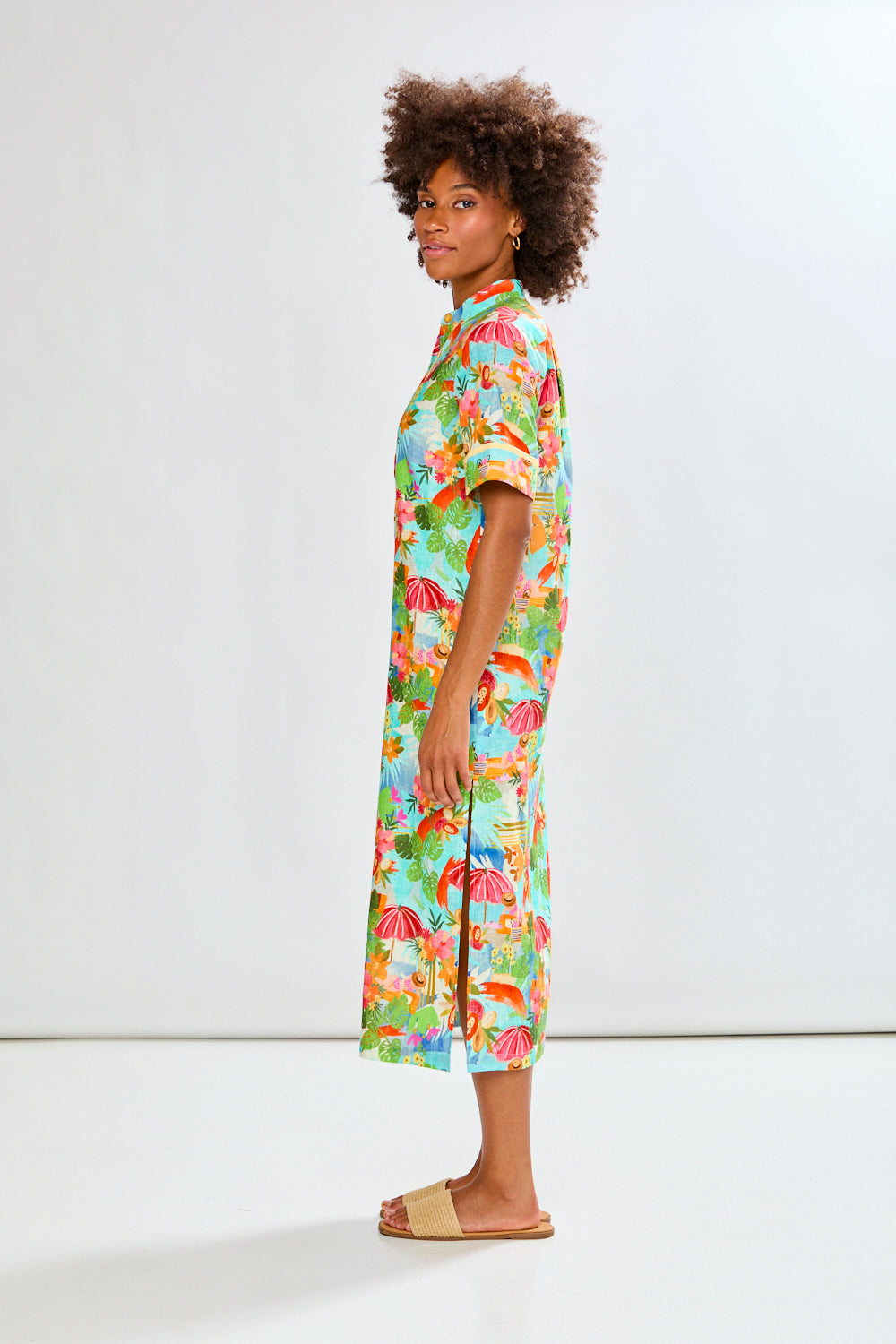 Woman in tropical full length dress
